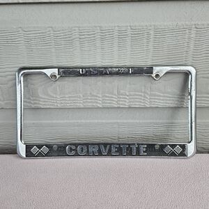VTG Chevrolet Corvette License Plate Tag Frame Chevy USA #1 Racing Flags Silver